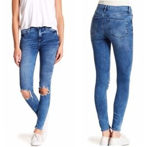 Free people busted knee skinny jeans